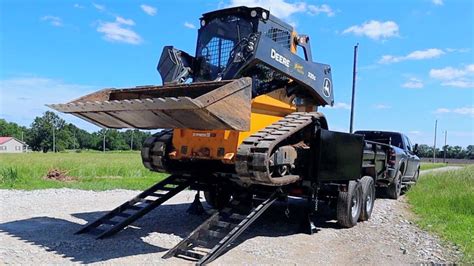 dump a trailer with skid steer|mini skid steer trailer package.